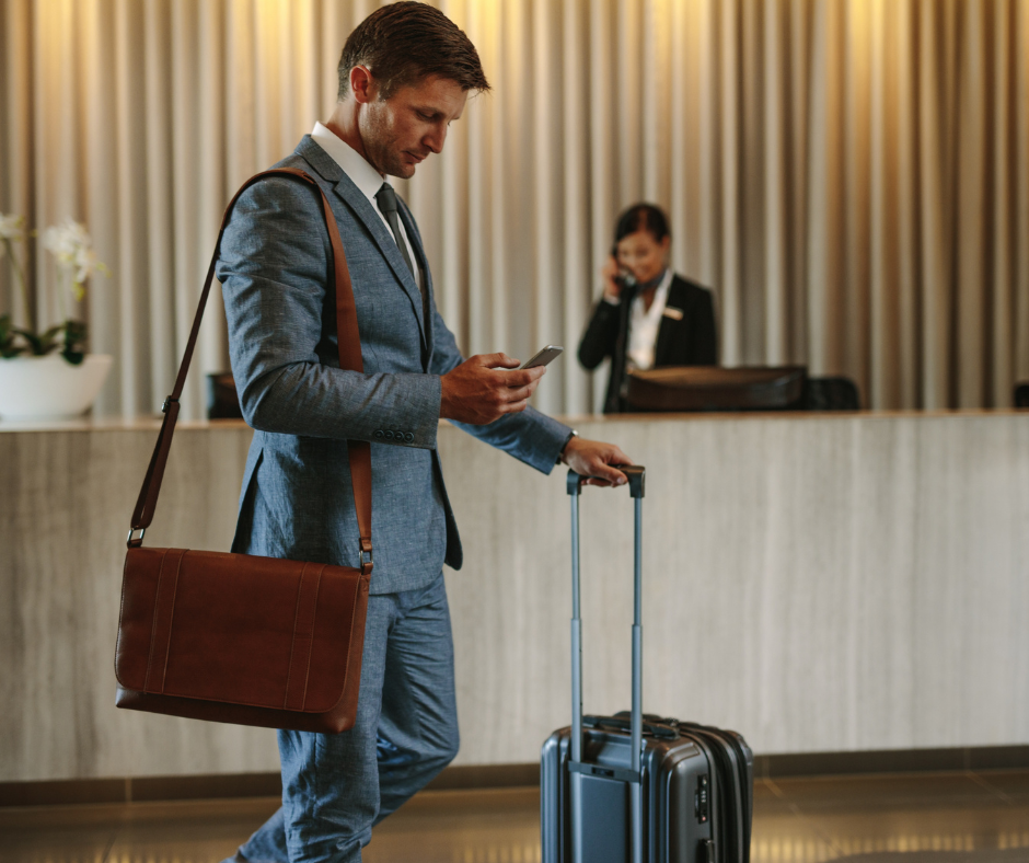 Business traveller arriving at hotel