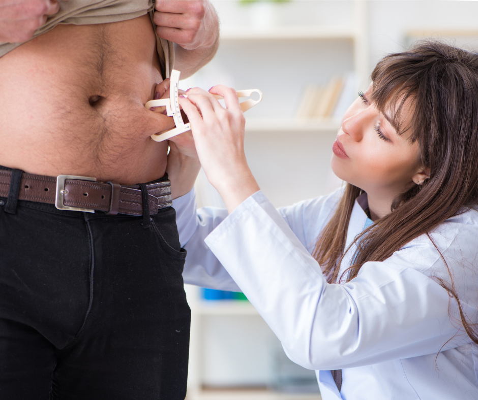 Pharmacist measuring a patients waist